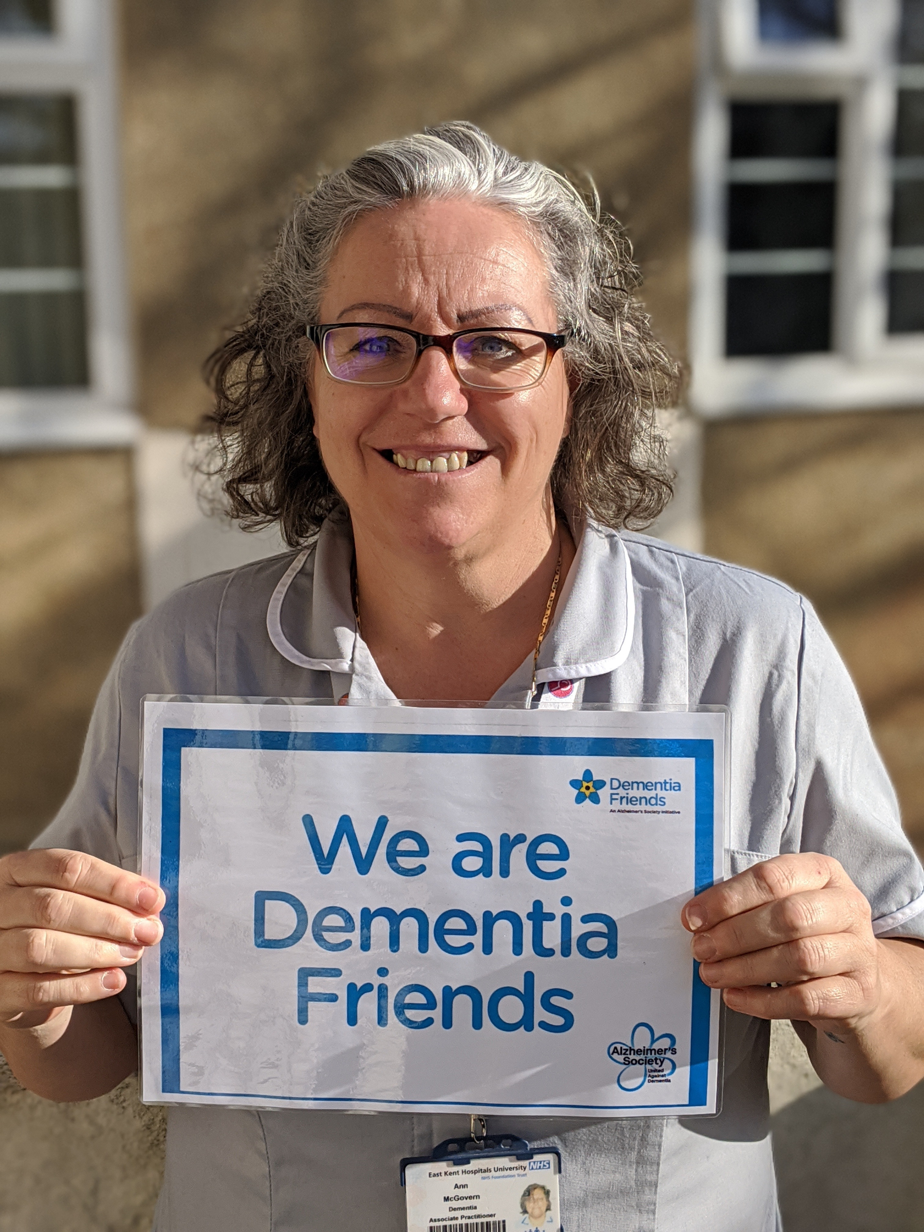 Ann McGovern with a Dementia Friends sign