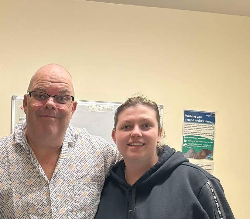 Courtnie with her dad David in hospital