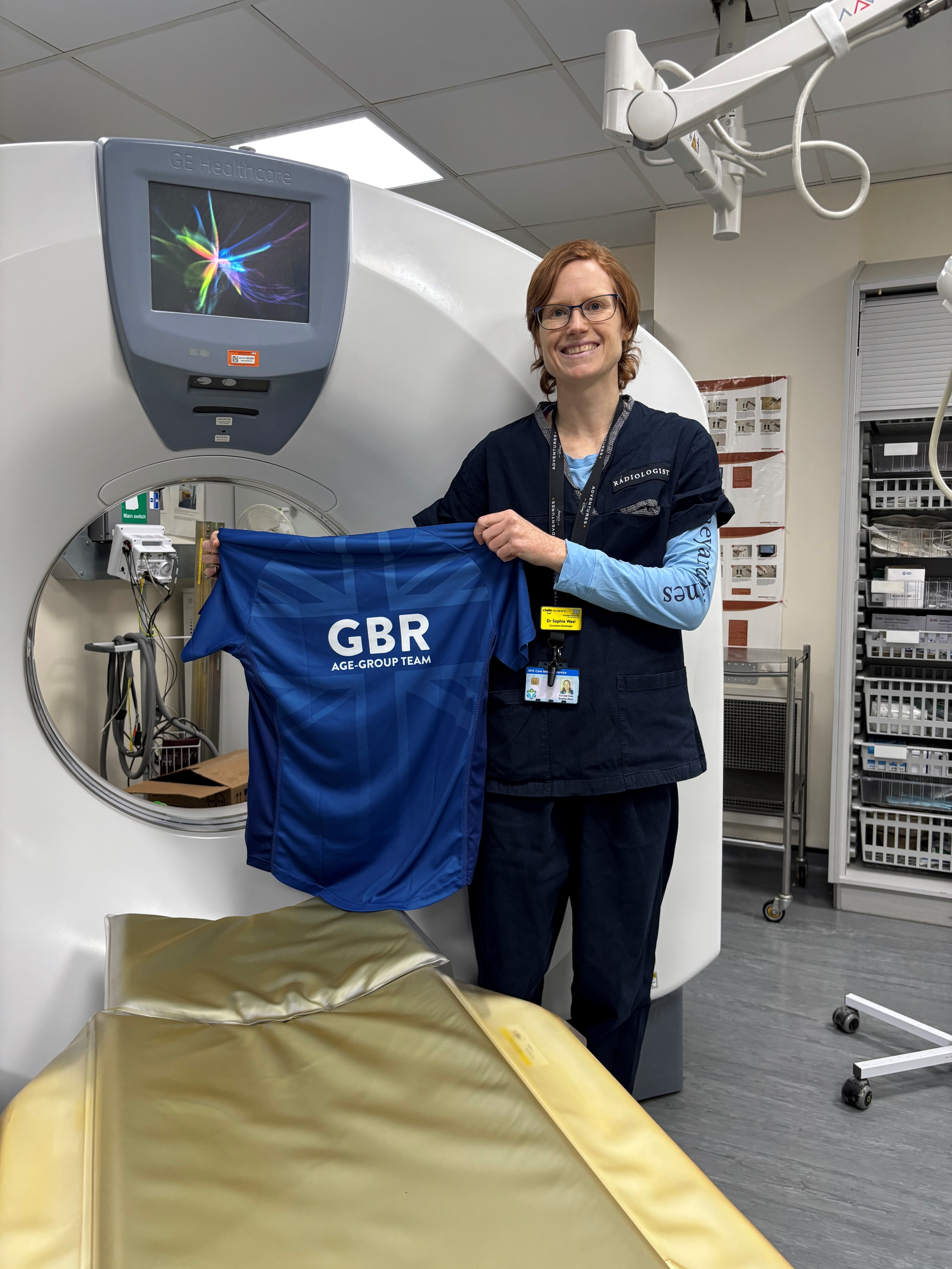 Sophie West with her Team GB t-shirt by a scanner