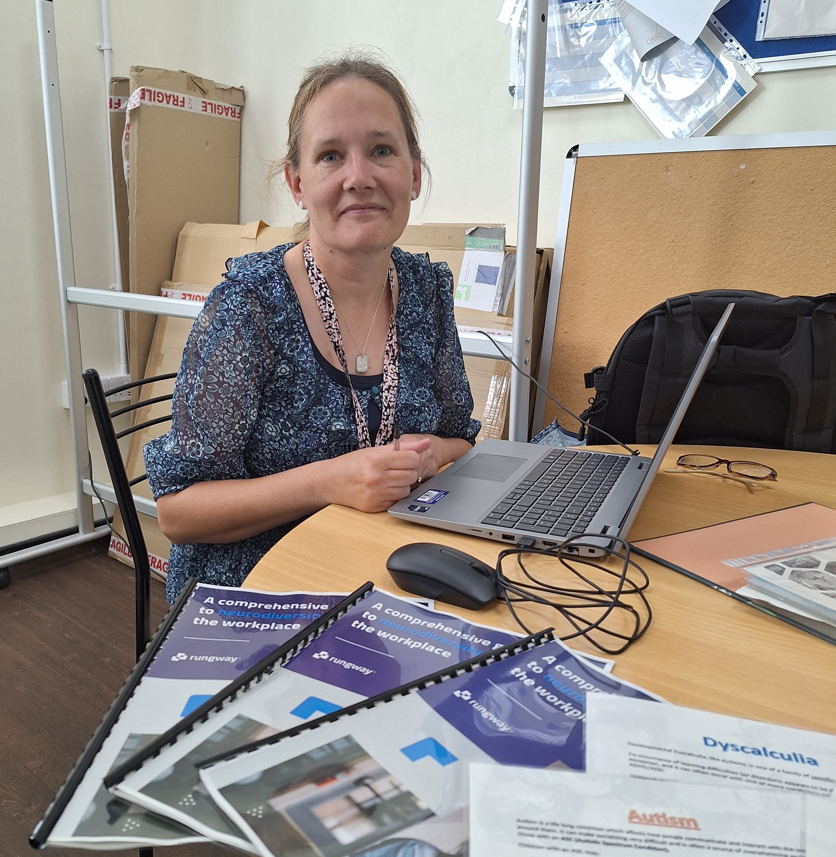 Tracey Stewart sat at her desk in front of her laptop