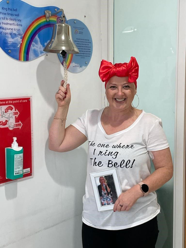 Vyckie Abbott ringing the bell after her treatment